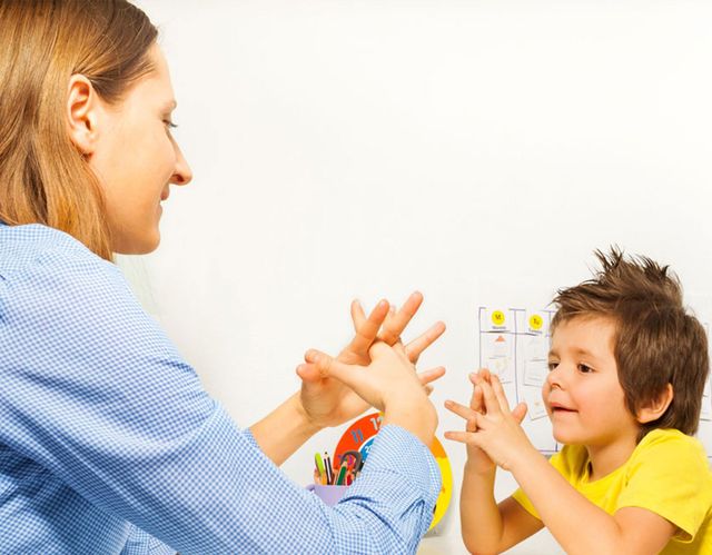 therapist working with boy
