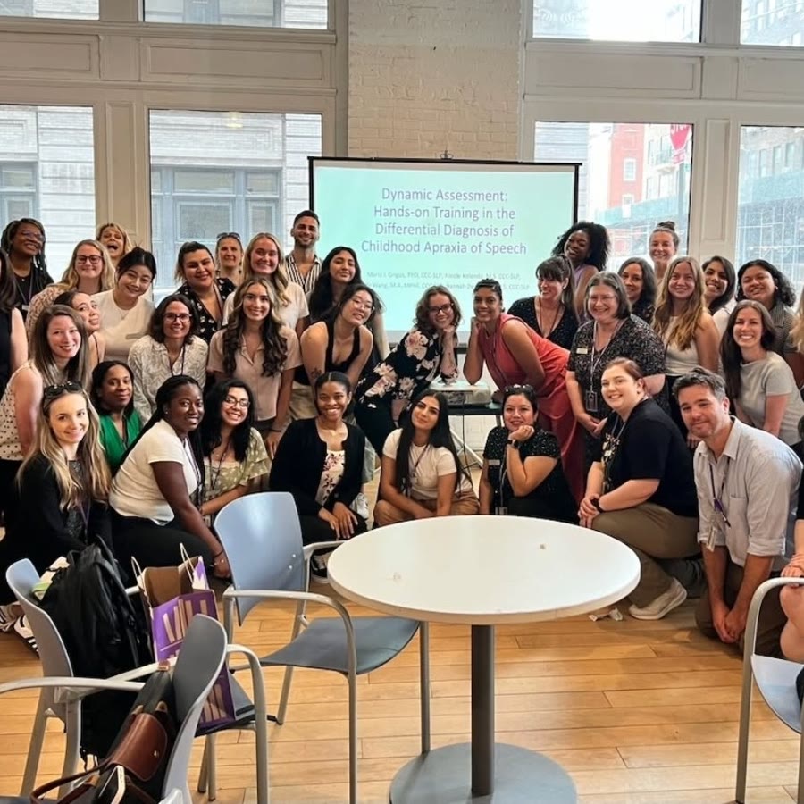 A large group of clinicians at a hands-on dynamic assessment training for childhood apraxia of speech