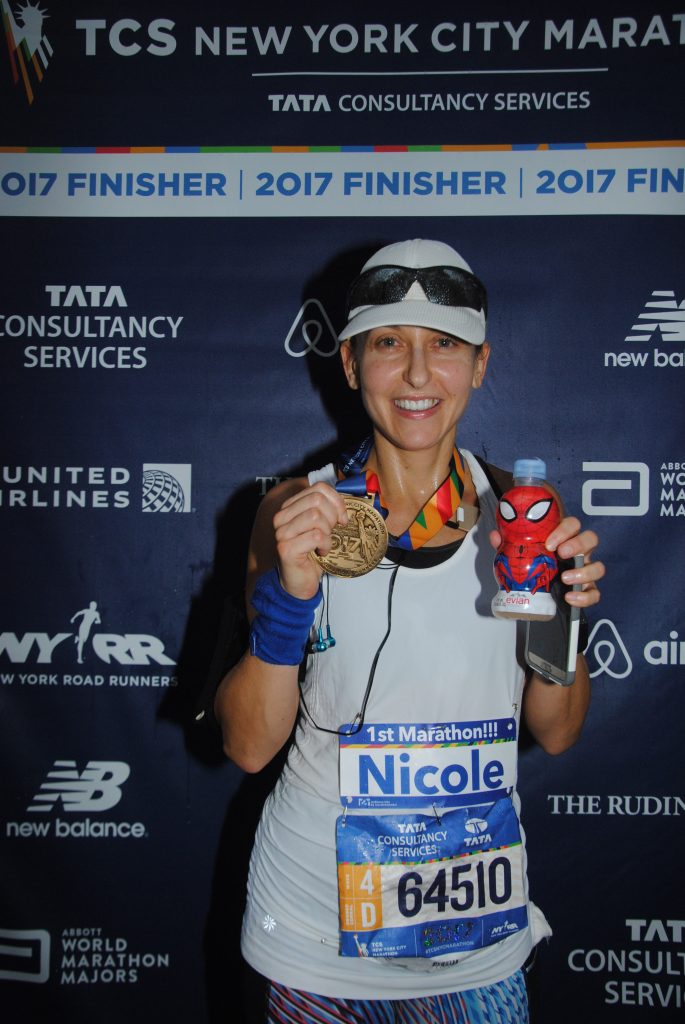 Nicole with her finisher's medal after the 2017 New York City Marathon