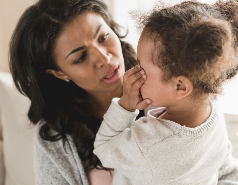 Girl Crying With Mom