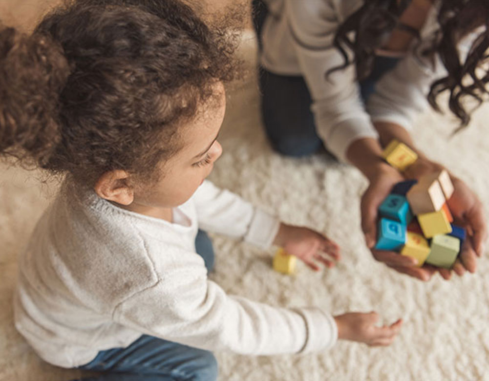 Girl playing with blocks